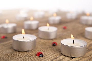 Image showing Candles with ladybugs