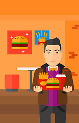 Image showing Man with fast food.