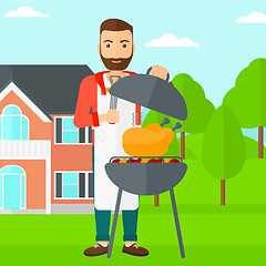 Image showing Man preparing barbecue.