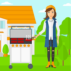 Image showing Woman preparing barbecue.