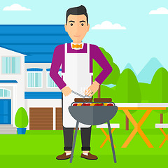 Image showing Man preparing barbecue.