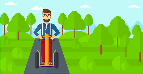 Image showing Man riding on electric scooter.