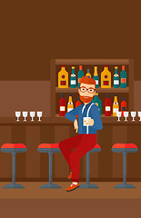 Image showing Man sitting at bar.