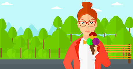 Image showing Woman holding icecream.