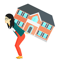 Image showing Woman carrying house.