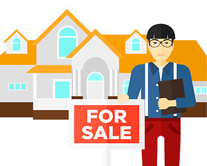 Image showing Real estate agent offering house.