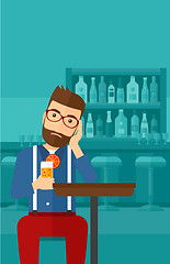 Image showing Man sitting at bar.