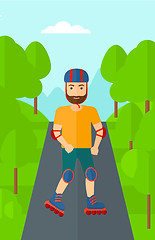 Image showing Sporty man on roller-skates.