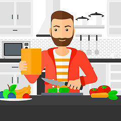 Image showing Man cooking meal.