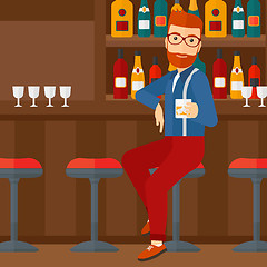 Image showing Man sitting at bar.