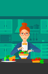 Image showing Woman cooking meal.