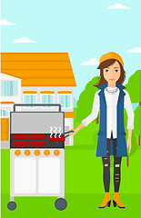 Image showing Woman preparing barbecue.