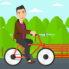 Image showing Man riding bicycle.