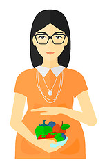 Image showing Pregnant woman with vegetables.