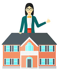 Image showing Real estate agent showing thumb up.