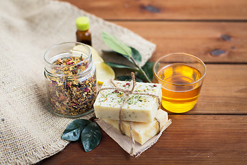 Image showing close up of handmade soap bars on wood