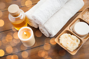 Image showing close up of natural cosmetics and bath towels