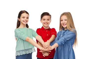 Image showing happy boy and girls with hands on top