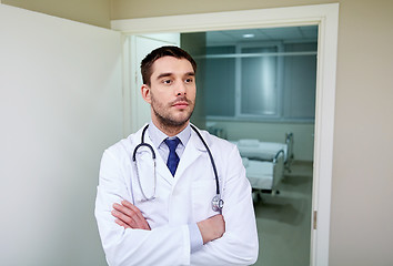 Image showing doctor with stethoscope at hospital corridor