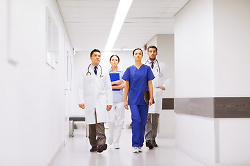 Image showing group of medics or doctors at hospital corridor