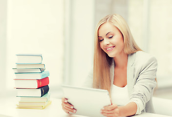 Image showing student with books and tablet pc