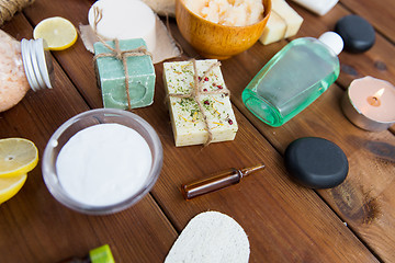 Image showing close up of body care cosmetic products on wood