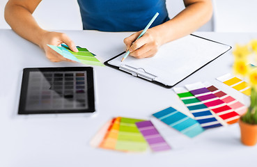 Image showing woman working with color samples for selection