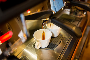 Image showing close up of espresso machine making coffee