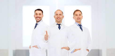 Image showing group of doctors at hospital showing thumbs up