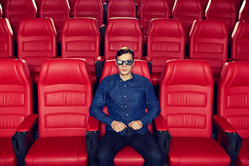 Image showing young man watching movie in 3d theater