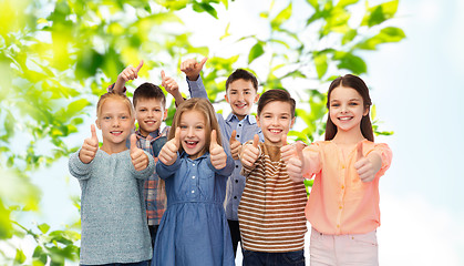 Image showing happy children showing thumbs up