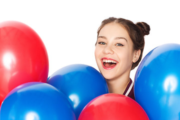 Image showing happy teenage girl with helium balloons