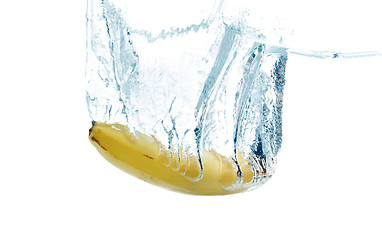 Image showing banana falling or dipping in water with splash