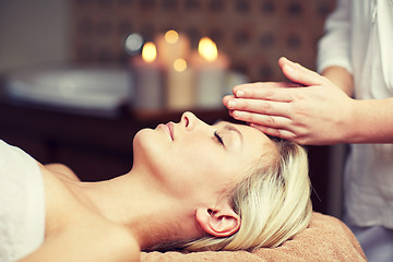 Image showing close up of woman having face massage in spa