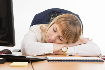Image showing Secretary sweetly asleep in the workplace