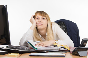 Image showing Office tired a specialist to work with documents and wants to go home