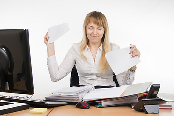 Image showing Business woman torn paper document