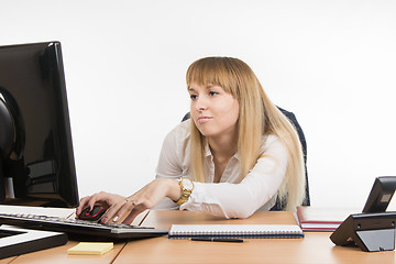 Image showing Sad tired office a specialist working on the computer