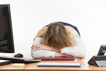 Image showing Office worker sleeping on the job