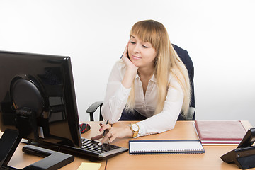 Image showing Office employee working at a leisurely computer