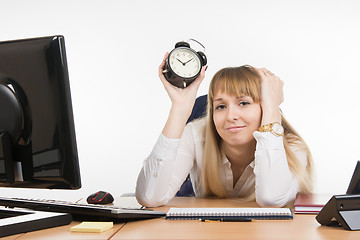 Image showing Dull office employee knows what lies ahead time