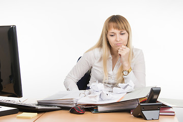 Image showing Office Specialist from nerves and fatigue crushed some important documents