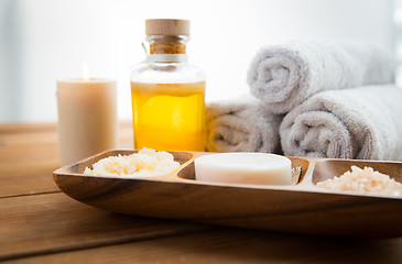 Image showing close up of soap, himalayan salt and scrub in bowl