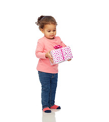 Image showing beautiful little baby girl with birthday present