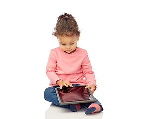 Image showing little baby girl playing with tablet pc computer