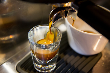 Image showing close up of espresso machine making coffee