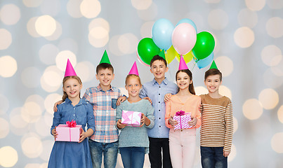 Image showing happy children with gifts on birthday party