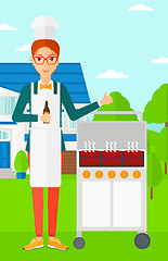 Image showing Woman preparing barbecue.