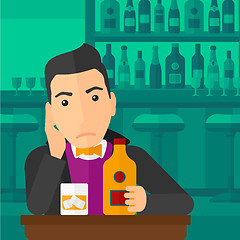 Image showing Sad man with bottle and glass.