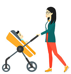 Image showing Woman pushing pram.